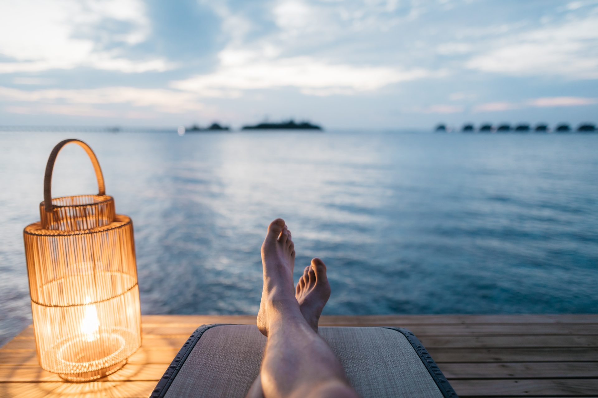 Relaxing on a dock by a lake at a vacation property