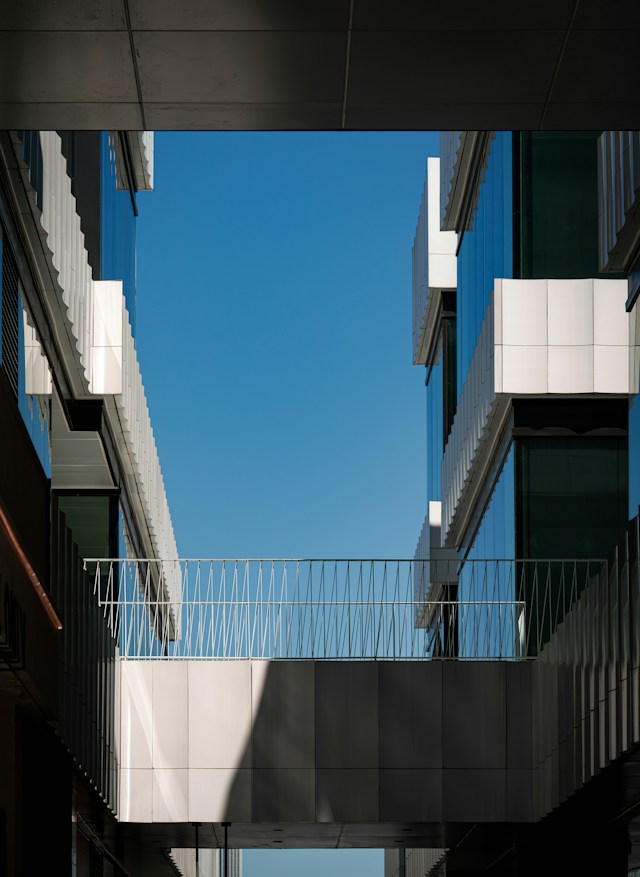 Modern building facade against a blue sky